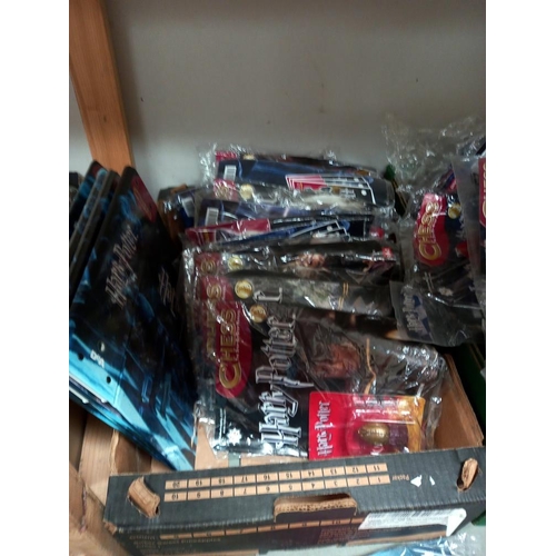 85 - A quantity of Harry Potter chess pieces and magazines