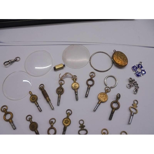 1088 - A quantity of pocket watch keys etc.,