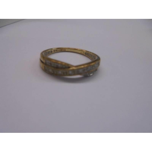 1108 - A 9ct gold and diamond ring (needs a good clean), size P, 2 grams.