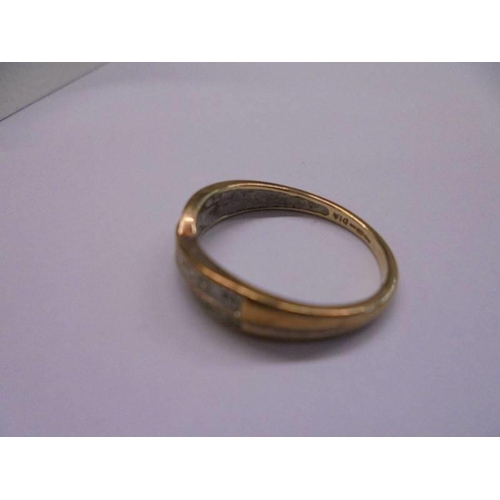 1108 - A 9ct gold and diamond ring (needs a good clean), size P, 2 grams.