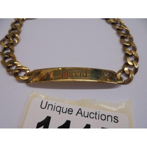 1115 - A gold identity bracelet set diamond chip and engraved DAVID, marked Italy 375, 11.1 grams.