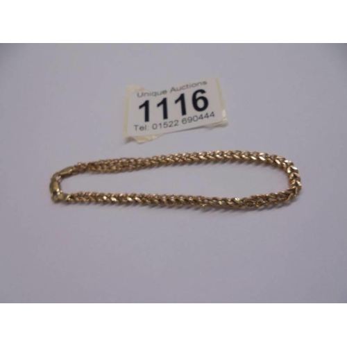 1116 - A gold identity bracelet marked Italy 375, 2.6 grams.