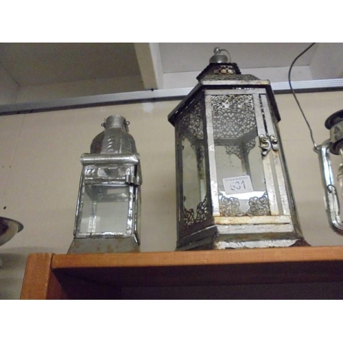 531 - A hurricane lamp and three lanterns, COLLECT ONLY.