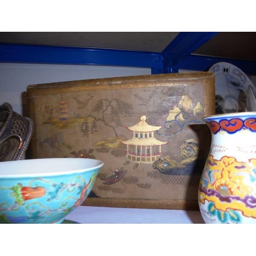 543 - A pair of oriental vases, a rice bowl and a lacquered box.