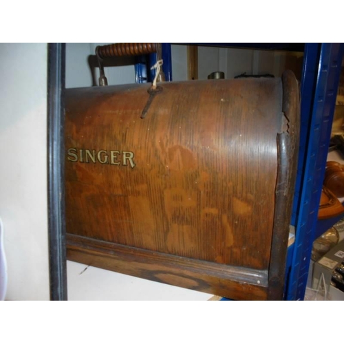 554 - A Singer manual sewing machine, COLLECT ONLY.