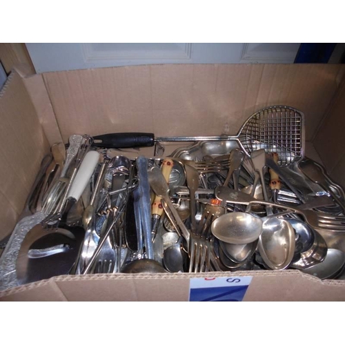 555 - A large box of assorted cutlery and a stainless steel tea set on tray, COLLECT ONLY.