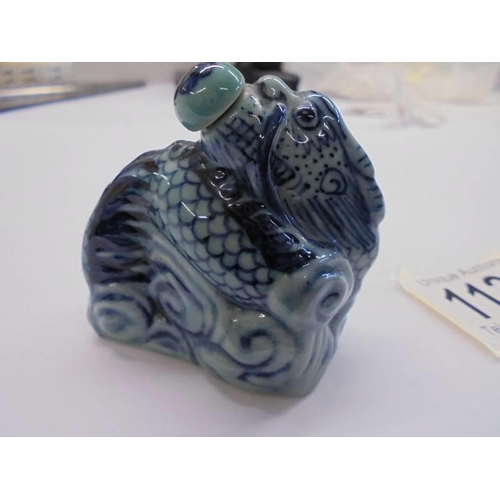 1125 - A Chinese porcelain scent bottle with four symbol mark.