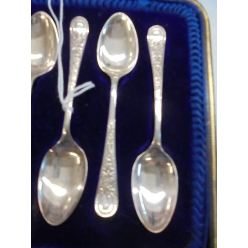 1126 - A cased set of six silver teaspoons,