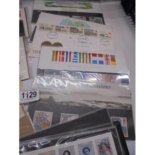 1129 - A mixed lot of first day covers etc.,