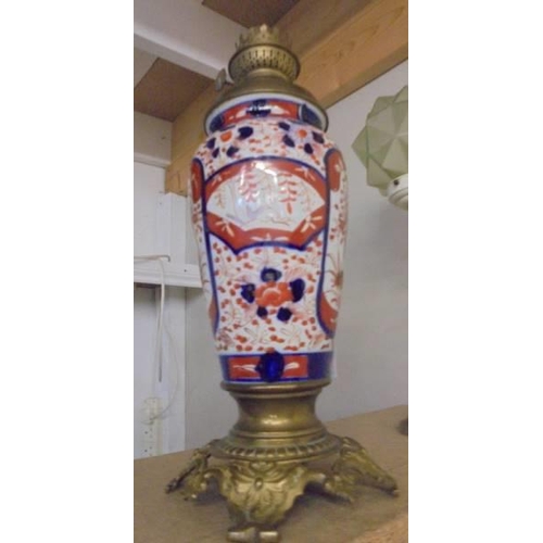 1132 - A 19th century Chinese Imari vase oil lamp base with brass fittings.