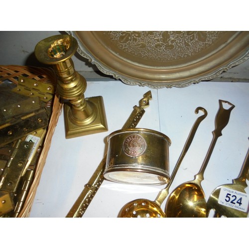 524 - A mixed lot of brass ware including candlesticks, trivet, wine coaster etc.,