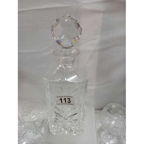 113 - A glass decanter and 6 glasses