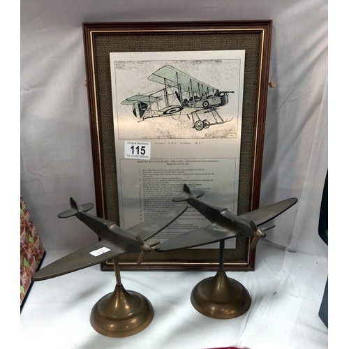 115 - 2 brass aeroplanes and a framed metal sign 'first set of rules'