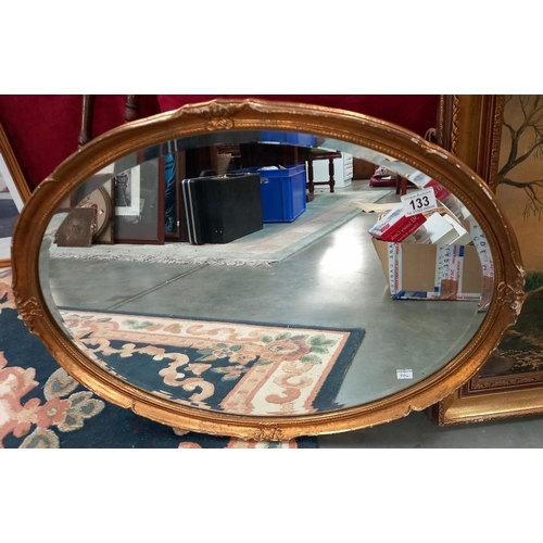 133 - A vintage ormalu gilt framed oval bevel edged mirror COLLECT ONLY