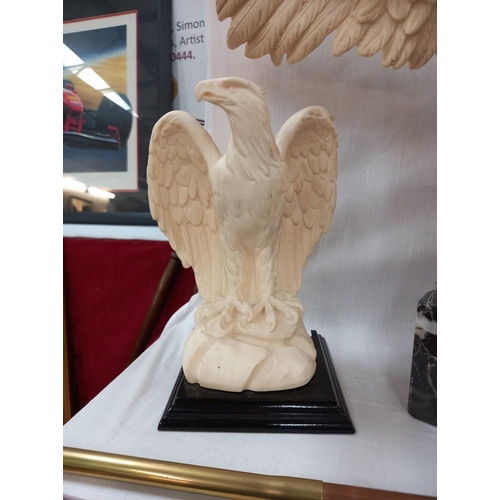 135 - 2 ornate eagle ornaments, 1 on marble base, 1 claw a/f