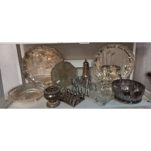 87 - A varied selection of silver plated and chrome metalware on 3 shelves