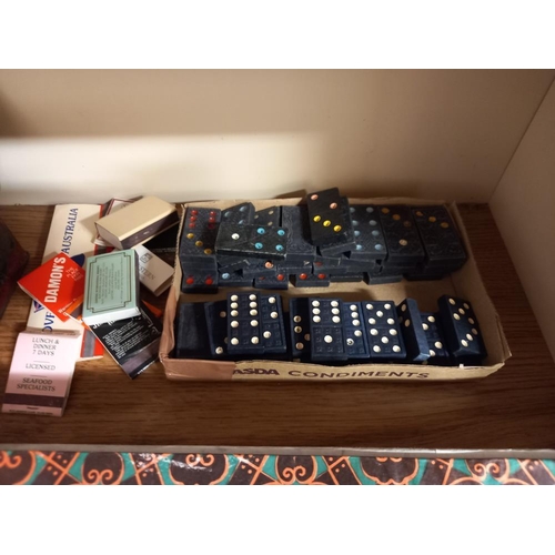 94 - A vintage Mahjong set and various counters, dominoes & a games table etc. (games table missing 1 dra... 