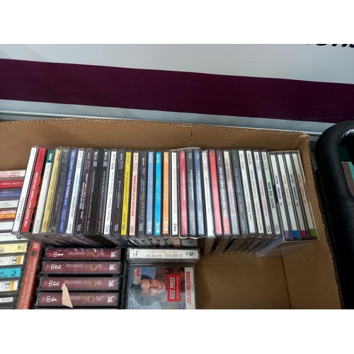 884 - 2 boxes of CD's & cassette tapes, mostly easy & a few pop etc. COLLECT ONLY