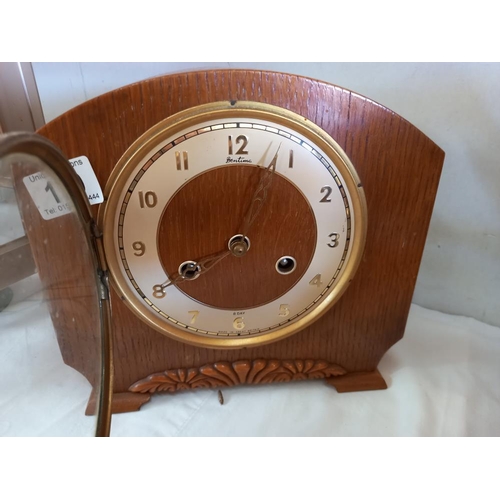 179 - A 1930's oak mantle clock, no pendulum and a bowl made of teak from HMS Spartiate