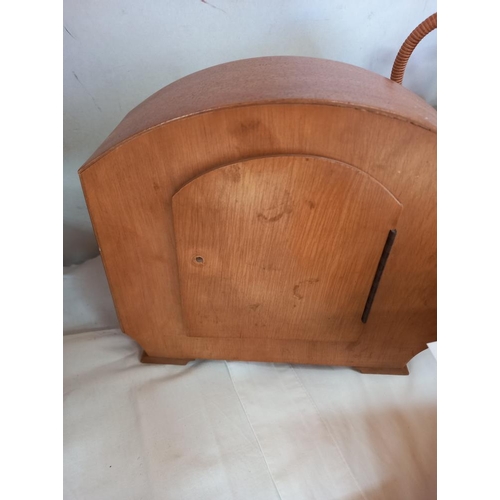 179 - A 1930's oak mantle clock, no pendulum and a bowl made of teak from HMS Spartiate