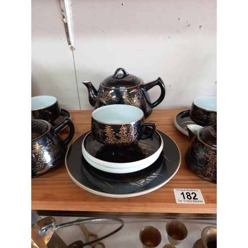 182 - A vintage LGTC Japan black and gold tea set (missing 1 cup)