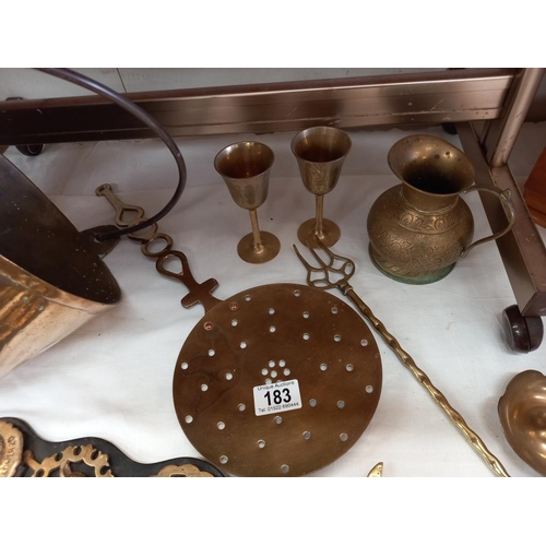 183 - A Victorian jam pan and other brassware including horse brasses, Lincoln Imp toasting fork etc