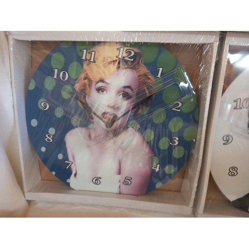 193 - 2 Marilyn Monroe clocks and 1 Audrey Hepburn (all sealed)