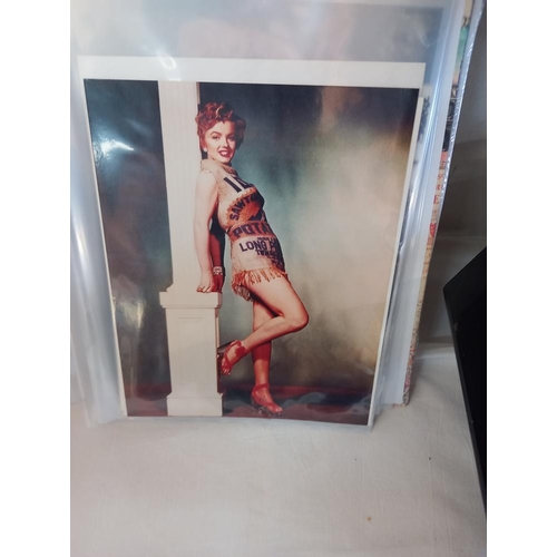 195 - A quantity of Marilyn Monroe photos and photocards etc