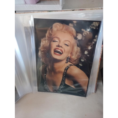 195 - A quantity of Marilyn Monroe photos and photocards etc