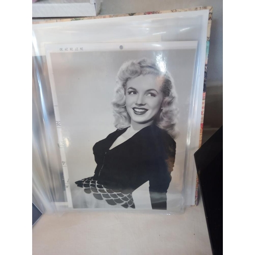 195 - A quantity of Marilyn Monroe photos and photocards etc