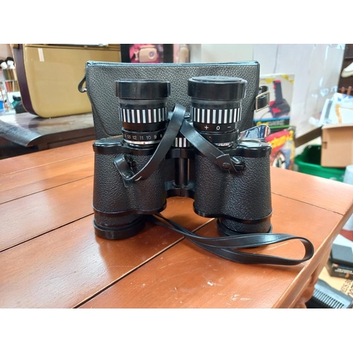 223 - A pair of Tasco binoculars in case 7 x -15 x 35