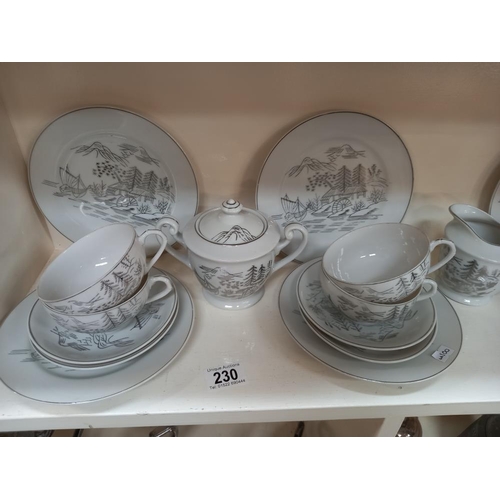 230 - An Oriental china tea set plus two trios and a teapot