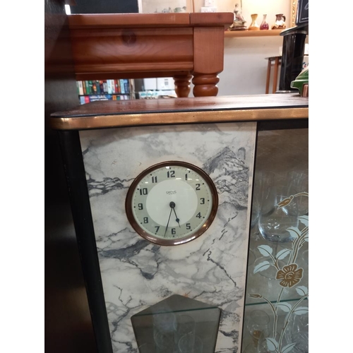 235 - A retro 1950's display cabinet with integral working Smiths clock COLLECT ONLY