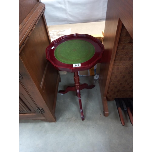 242 - A redwood stand tripod side/wine table with gilded green leather insert top COLLECT ONLY