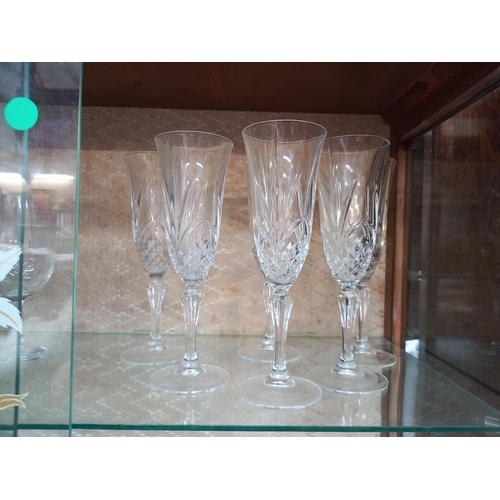 244 - A glass decanter & a good lot of assorted drinking glasses in 8's, 6's & 4's. COLLECT ONLY