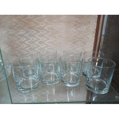 244 - A glass decanter & a good lot of assorted drinking glasses in 8's, 6's & 4's. COLLECT ONLY