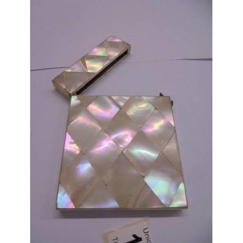 1166 - A Victorian mother of pearl card case.