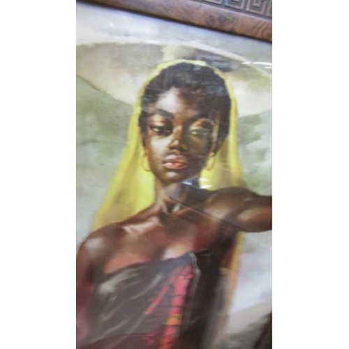 589 - A framed and glazed study of an African lady.  COLLECT ONLY.