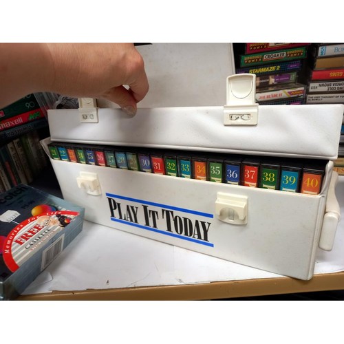 513 - A shelf of assorted CD's and cassette tapes.