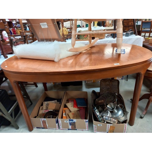 246 - An extending teak dining table COLLECT ONLY