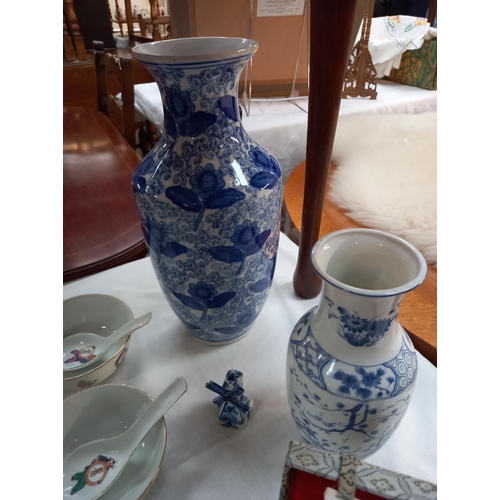 255 - Blue and white Chinese teapots, soup bowls, spoons etc