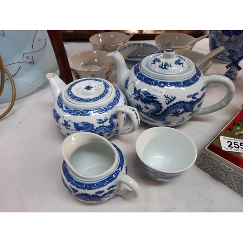 255 - Blue and white Chinese teapots, soup bowls, spoons etc