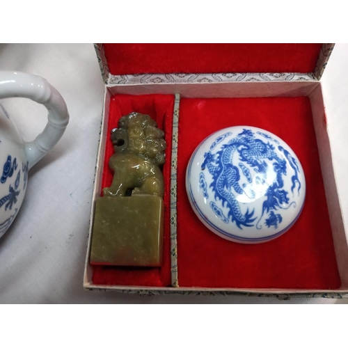 255 - Blue and white Chinese teapots, soup bowls, spoons etc