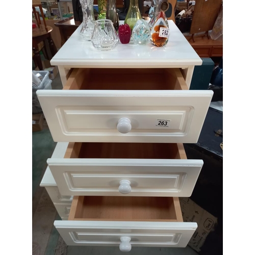 263 - A white bedroom chest of drawers and a matching bedside cabinet COLLECT ONLY