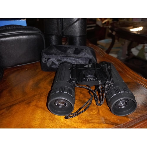 268 - 4 small binoculars, 3 with cases