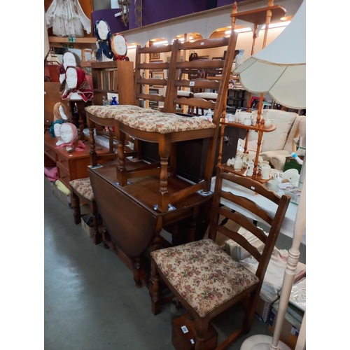 291 - An oak gateleg table with 4 chairs COLLECT ONLY