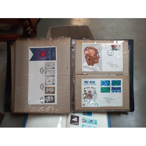 292 - An album of FDC first day covers and a stamp album and contents