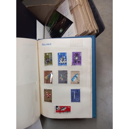 292 - An album of FDC first day covers and a stamp album and contents