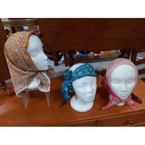 295 - 10 ladies headscarves including silk ones (heads not  included)