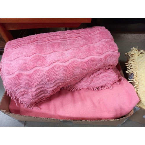 297 - A double pink candlewick bedspread with pink blanket and a single yellow candlewick bedspread and a ... 